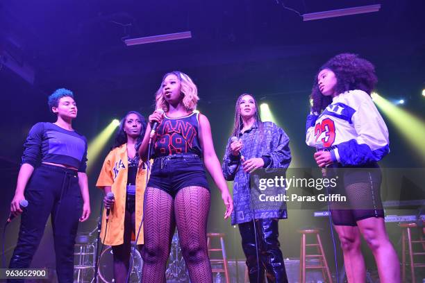 Ashly Williams, Brienna DeVlugt, Gabby Carreiro, Kristal Lyndriette and Shyann Roberts of band June's Diary perform onstage during his "Sum of My...