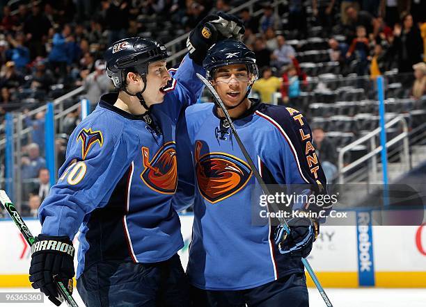 Colby Armstrong of the Atlanta Thrashers celebrates after scoring a goal against the Anaheim Ducks with Evander Kane at Philips Arena on January 26,...