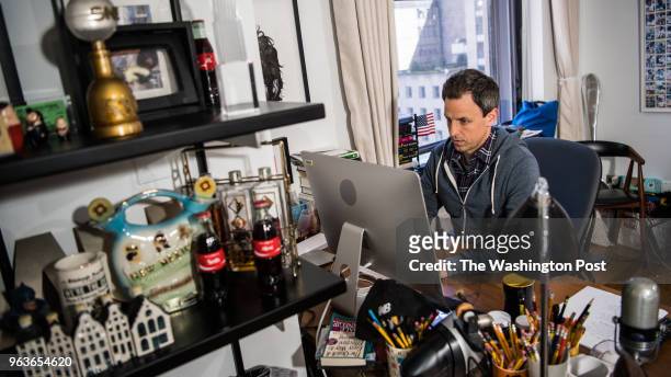 S Late Night host Seth Meyers works on his computer in his office on Wednesday, May 2 at 30 Rockefeller Plaza, in New York City, NY.