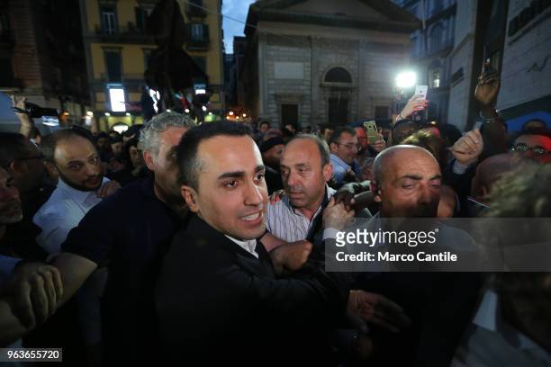 The political leader of the 5 Star Movement, Luigi Di Maio, during a rally in Naples, greets his supporters.