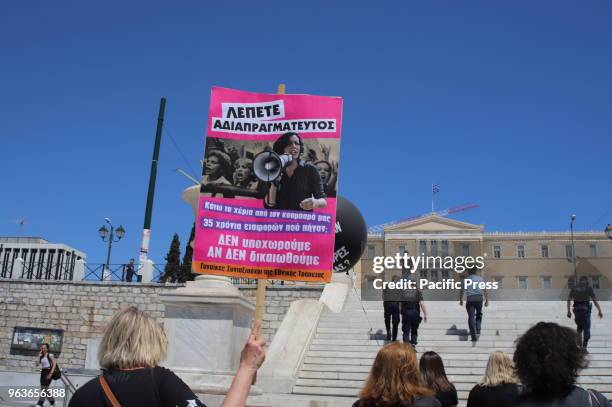 Pensioners of the National Bank of Greece demonstrate in Syntagma against reforms in the pension system that will result in further cuts to their...