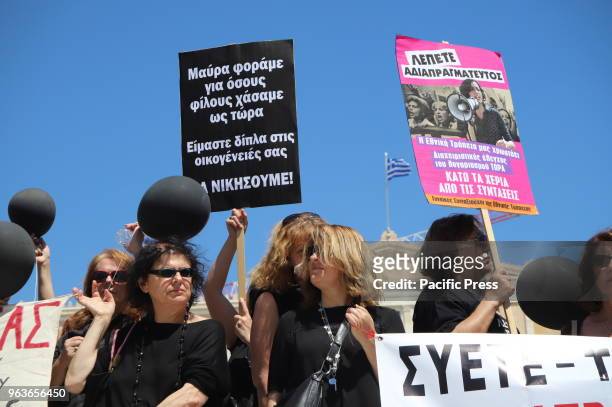 Pensioners of the National Bank of Greece demonstrate in Syntagma against reforms in the pension system that will result in further cuts to their...