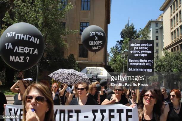 Pensioners of the National Bank of Greece demonstrate in Syntagma against reforms in the pension system that will result in further cuts to their...