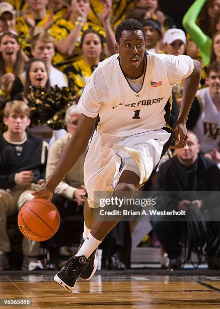 Al-Farouq Aminu of the Wake Forest Demon Deacons dribbles the ball up court during second-half action against the Miami Hurricanes on February 2,...