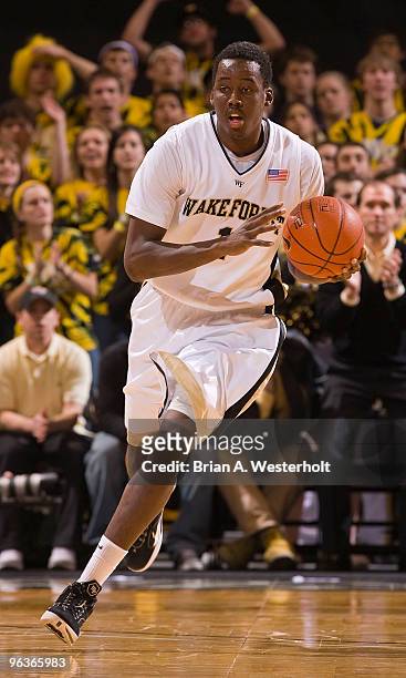 Al-Farouq Aminu of the Wake Forest Demon Deacons dribbles the ball up court during second half action against the Miami Hurricanes on February 2,...