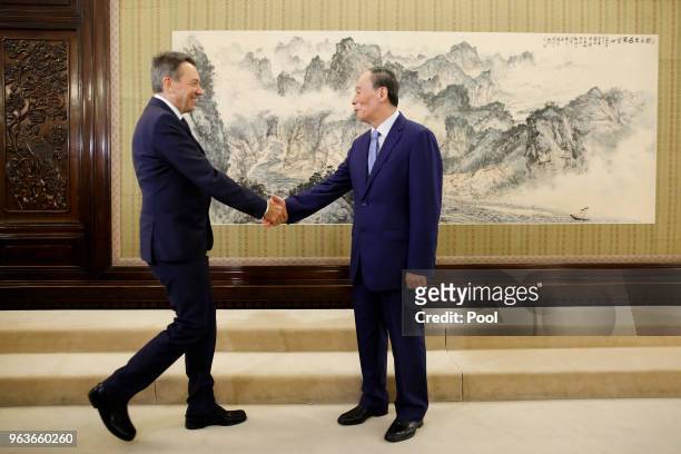 Chinese Vice President Wang Qishan greets International Committee of the Red Cross President Peter Maurer at Zhongnanhai on May 30, 2018 in Beijing,...