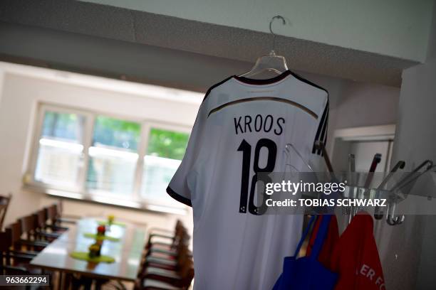 Football jersey of German national soccer player Toni Kroos is pictured inside the club restaurant at the 'Volksstadtion' stadium in Greifswald,...