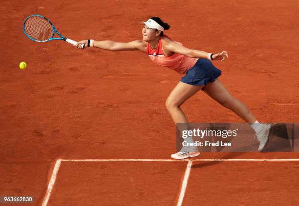 Yingying Duan of China in atcion during her ladies singles first round match against Caroline Garcia of France during day three of the 2018 French...