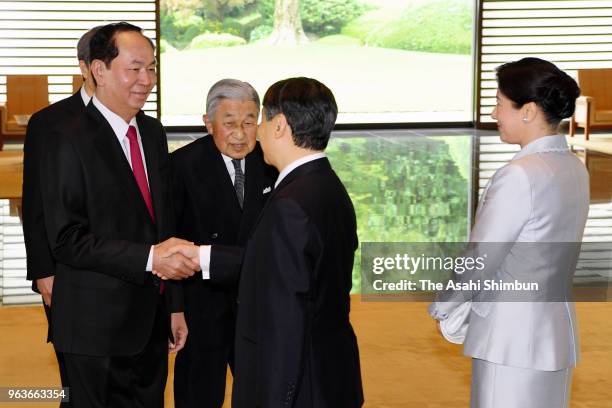 Emperor Akihito introduces Crown Prince Naruhito and Crown Princess Masako to Vietnamese President Tran Dai Quang prior to the welcome ceremony at...