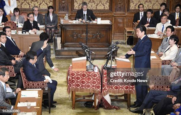 Japanese Prime Minister Shinzo Abe responds to questions from Constitutional Democratic Party of Japan leader Yukio Edano in his first Diet debate in...