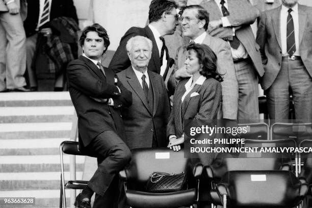 Photo taken on April 30, 1986 shows French president of the Olympique de Marseille football club Bernard Tapie, Mayor of Marseille Gaston Defferre...