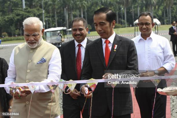 President of Republic Indonesia Joko Widodo and Indian Prime Minister Narendra Modi cut the ribbon before opening Indonesia - India kite Exhibition...