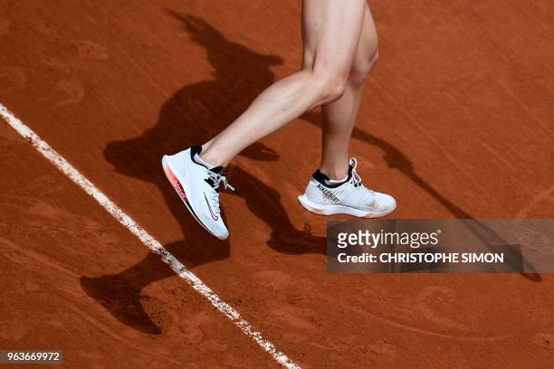 Ukraine's Elina Svitolina serves to Slovakia's Viktoria Kuzmova during their women's singles second round match on day four of The Roland Garros 2018...