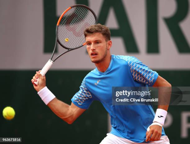 Pablo Carreno Busta of Spain plays a forehand during his mens singles second round match against Santiago Giraldo of Columbia during day four of the...