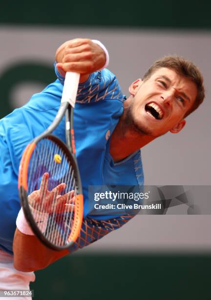 Pablo Carreno Busta of Spain serves during his mens singles second round match against Santiago Giraldo of Columbia during day four of the 2018...