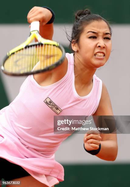 Zarina Diyas of Kazhakstan serves during the ladies singles second round match against Naomi Osaka of Japan during day four of the 2018 French Open...