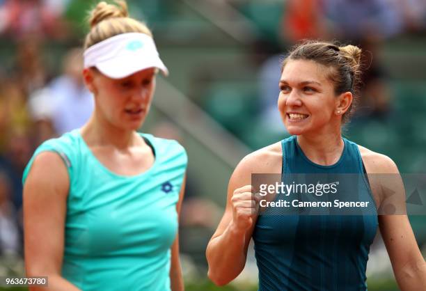 Simona Halep of Romania celebrates victory folowing her ladies singles second round match against Alison Riske of The United States during day four...
