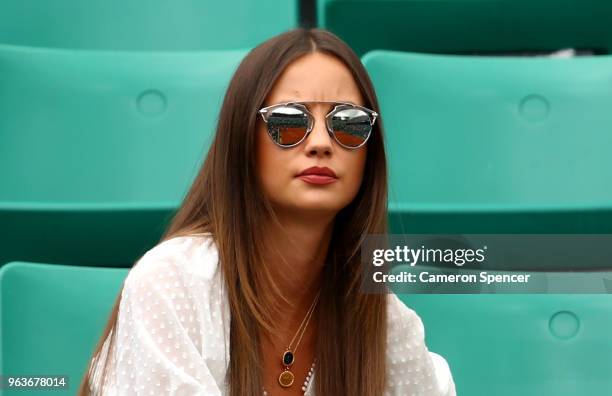 Ester Berdych Satorova, wife of Thomas Berdych of Czech Republic watches on as he plays his mens singles first round match against Jeremy Chardy of...