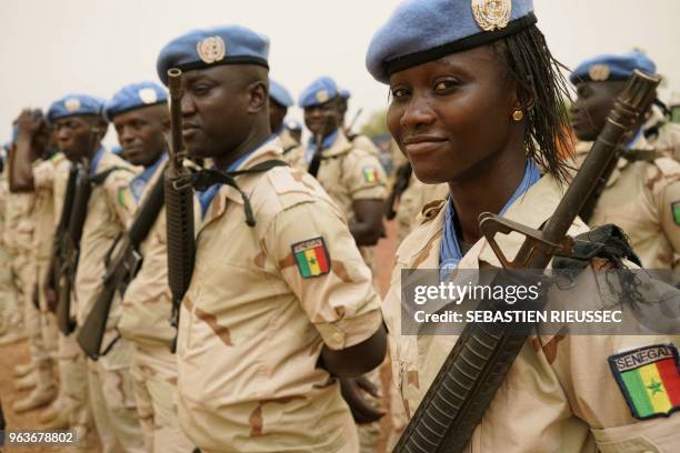 Senegalese peacekeepers belonging to the MINUSMA line up ahead of the arrival of United Nation General Secretary on May 30, 2018 in Sevare.