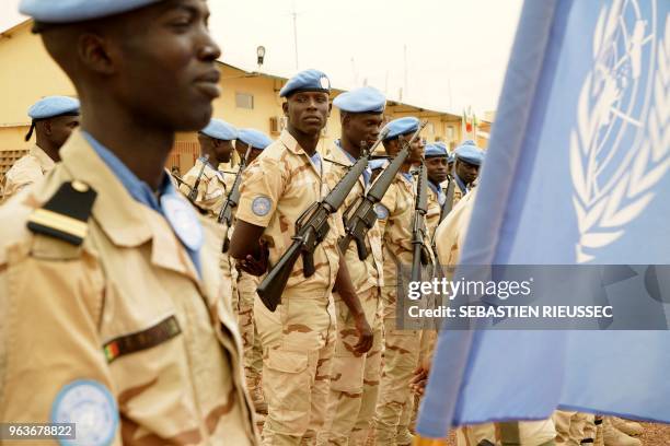 Senegalese peacekeepers belonging to the MINUSMA line up ahead of the arrival of United Nation General Secretary on May 30, 2018 in Sevare.