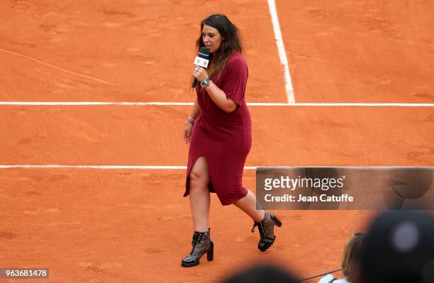 Marion Bartoli interviews players on court on Day Two of the 2018 French Open at Roland Garros stadium on May 28, 2018 in Paris, France.