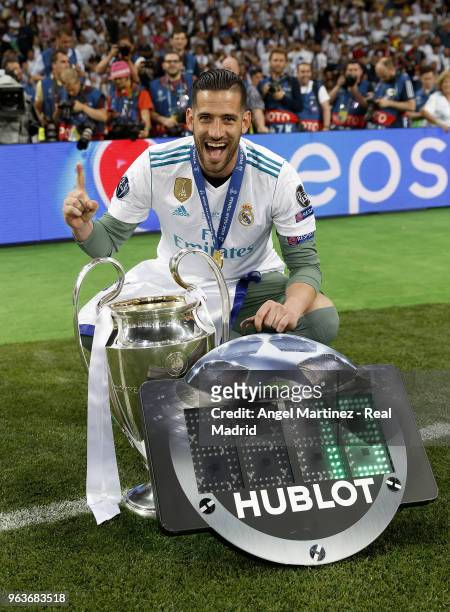 Kiko Casilla of Real Madrid celebrates with The UEFA Champions League trophy following his sides victory in the UEFA Champions League Final between...