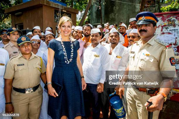 Queen Maxima of The Netherlands visits lunch box-carriers, locally known as Dabbawallas during a 3 day official visit to India on May 30, 2018 in...