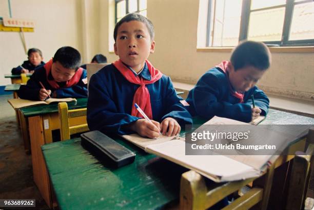 Children during lessons in a primary school in Hwasan.