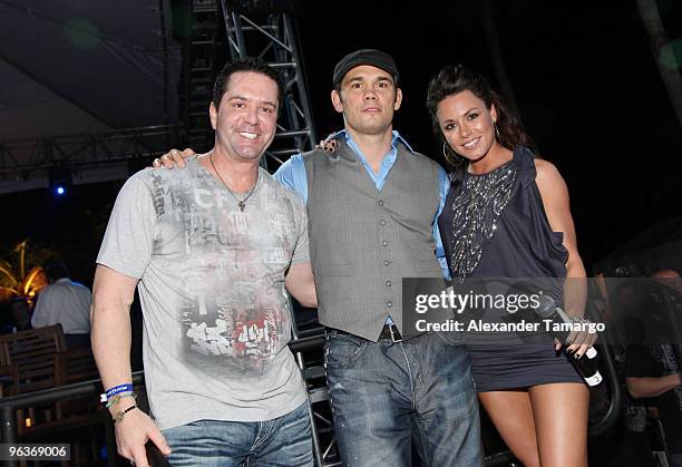 Mike Goldberg, Ryan Franklin and Rachelle Leah are seen at the Bud Light Hotel for the UFC Exhibition presented by Bud Light Hotel at Doubletree...