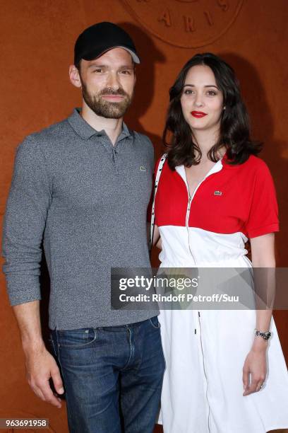 Actors Alban Lenoir and Anne Serra attend the 2018 French Open - Day Four at Roland Garros on May 30, 2018 in Paris, France.