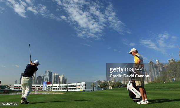 Tom Watson of the USA plays his second shot at the par 4, 9th hole as a preview for the 2010 Omega Dubai Desert Classic on the Majilis Course at the...