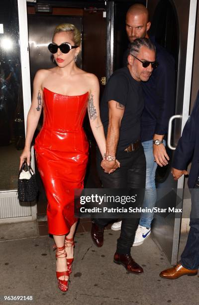 Lady Gaga and Christian Carino are seen on May 29, 2018 in New York City.