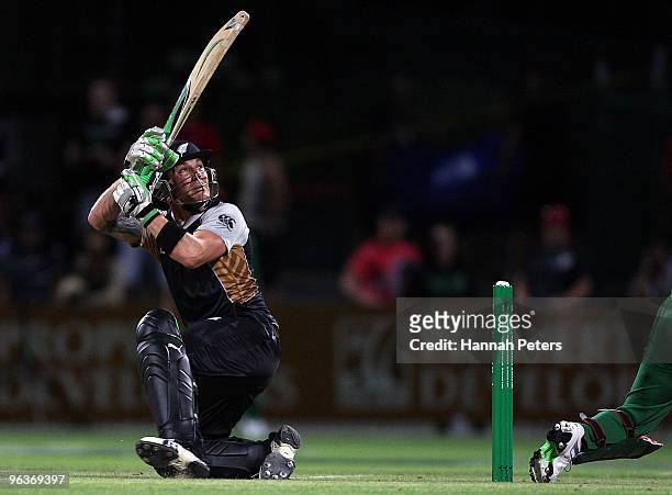 Brendon McCullum of New Zealand flicks the ball over his wickets for four runs the Twenty20 International match between New Zealand and Bangladesh at...