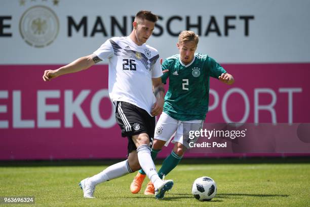 Niklas Suele of Germany and Felix Passlack of Germany U20's during a Germany v Germany U20 test match at German national team training camp on May...