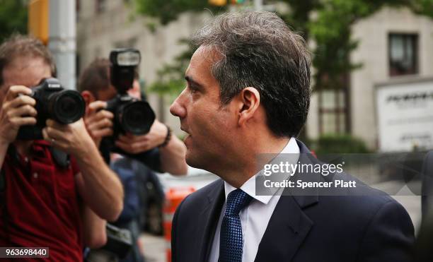 Michael Cohen, a longtime personal lawyer and confidante for President Donald Trump, arrives with his lawyers at the United States District Court...