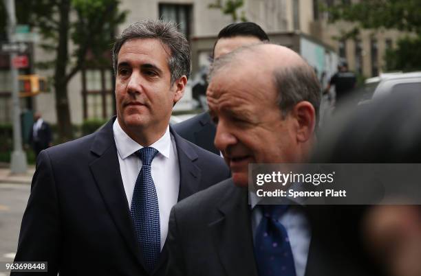 Michael Cohen, a longtime personal lawyer and confidante for President Donald Trump, arrives with his lawyers at the United States District Court...