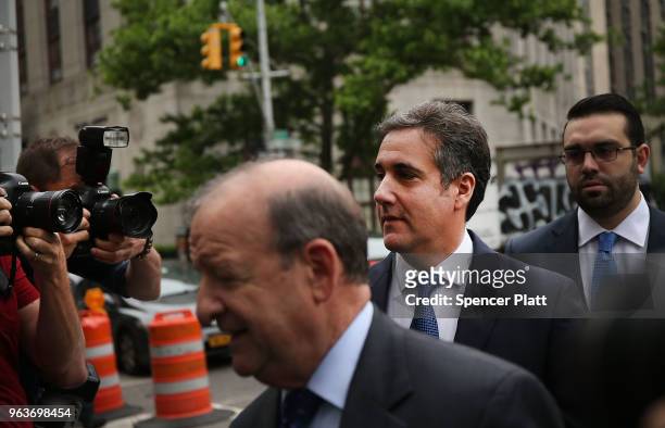 Michael Cohen, a longtime personal lawyer and confidante for President Donald Trump, arrives with his lawyers at the United States District Court...