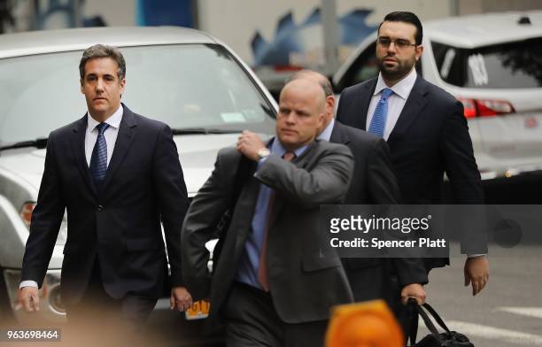 Michael Cohen , a longtime personal lawyer and confidante for President Donald Trump, arrives with his lawyers at the United States District Court...