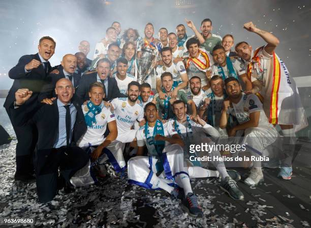 The Players of Real Madrid pose for a photo during Real Madrid team celebration at Santiago Bernabeu Stadium after winning their 13th European Cup on...