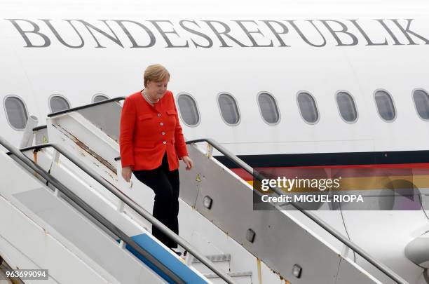 German Chancellor Angela Merkel arrives at the Francisco Sa Carneiro airport for a two-days visit in Porto, on May 30, 2018.