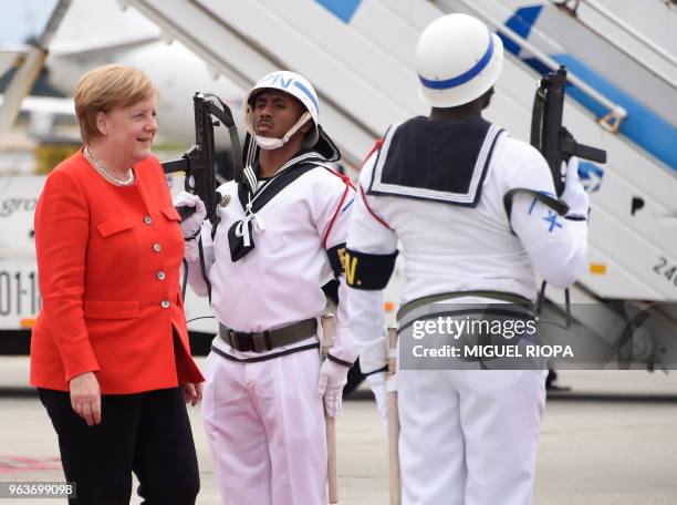 German Chancellor Angela Merkel arrives at the Francisco Sa Carneiro airport for a two-days visit in Porto, on May 30, 2018.