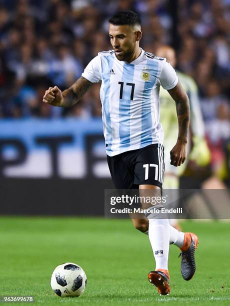 Nicolas Otamendi of Argentina drives the ball during an international friendly match between Argentina and Haiti at Alberto J. Armando Stadium on May...