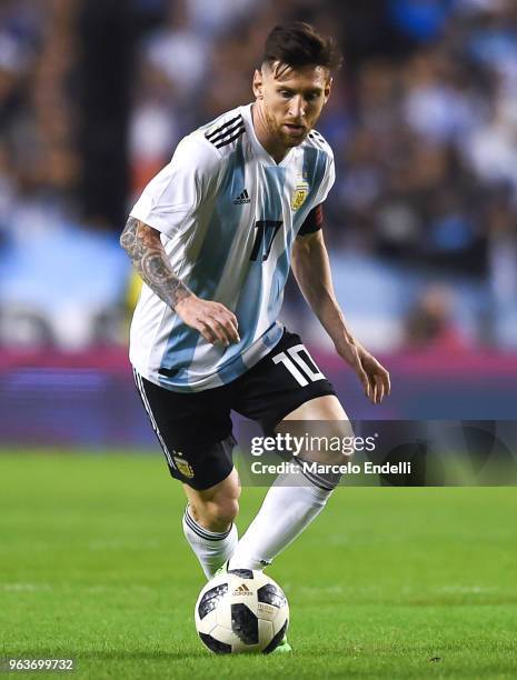 Lionel Messi of Argentina drives the ball during an international friendly match between Argentina and Haiti at Alberto J. Armando Stadium on May 29,...