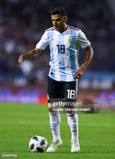 Eduardo Salvio of Argentina drives the ball during an international friendly match between Argentina and Haiti at Alberto J. Armando Stadium on May...