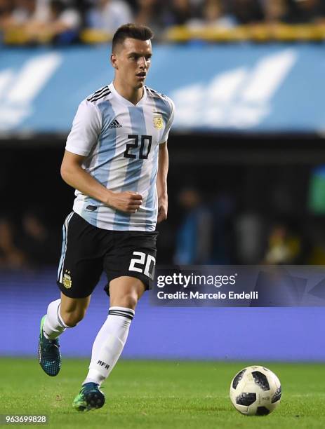 Giovani Lo Celso of Argentina drives the ball during an international friendly match between Argentina and Haiti at Alberto J. Armando Stadium on May...