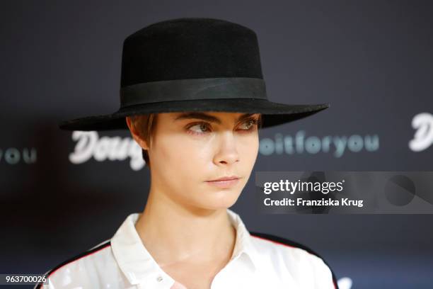 Cara Delevigne attends the Douglas store event on May 30, 2018 in Berlin, Germany.