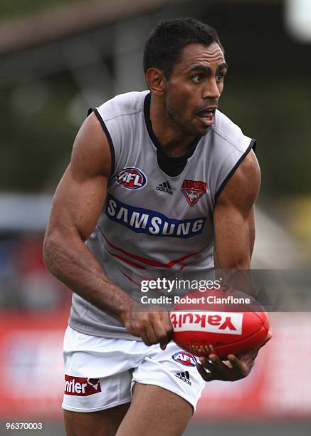 Nathan Lovett-Murray of the Bombers runs with the ball during an Essendon Bombers intra-club AFL match at Deakin Oval on February 3, 2010 in...