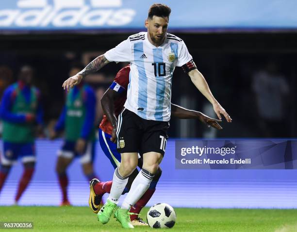 Lionel Messi of Argentina drives the ball during an international friendly match between Argentina and Haiti at Alberto J. Armando Stadium on May 29,...