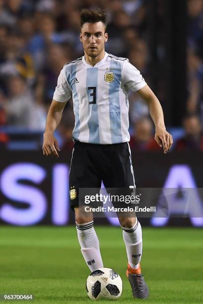 Nicolas Tagliafico of Argentina drives the ball during an international friendly match between Argentina and Haiti at Alberto J. Armando Stadium on...