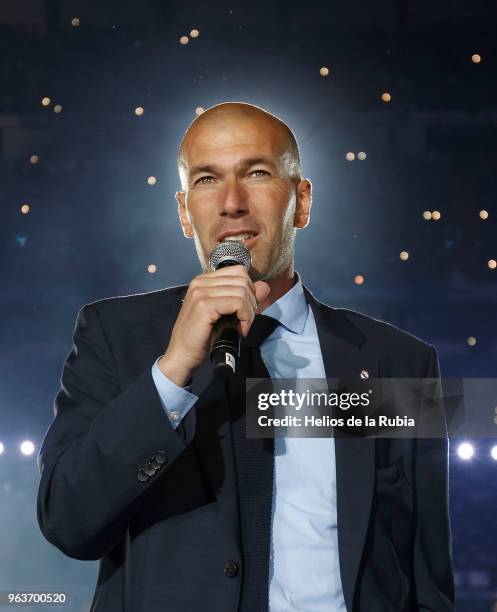 Zinedine Zidane, Manager of Real Madrid talks to supporters during Real Madrid team celebration at Santiago Bernabeu Stadium after winning their 13th...